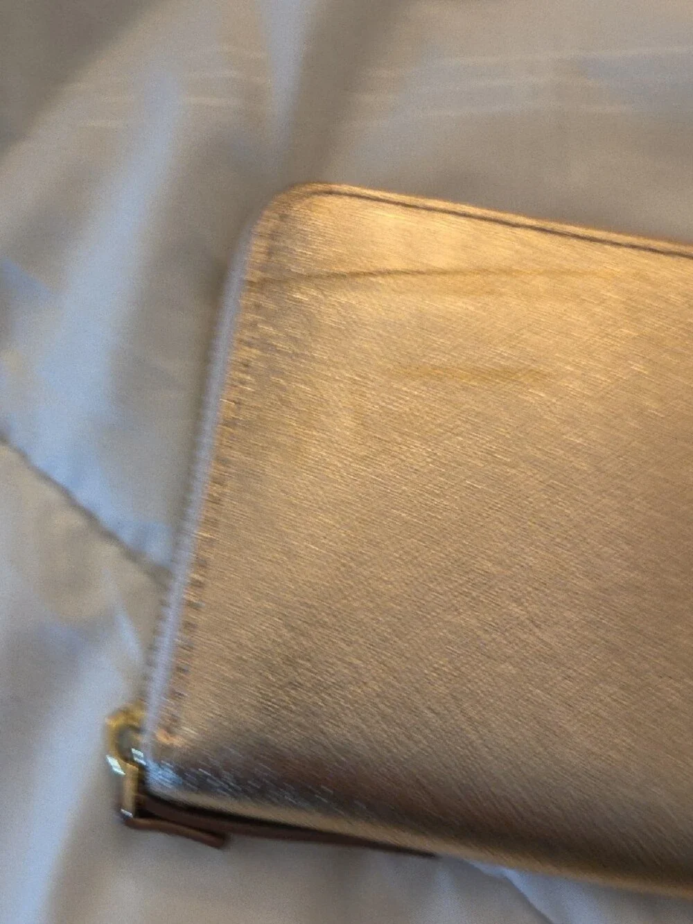 kate spade metallic rose gold zip-around wallet